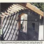 There's a continuous bond beam with four bars of 1/2" steel on the top of the wall. Rafters were toenailed to treated 2-by-12's embedded in the bond beam. Concrete was then poured between the rafters.