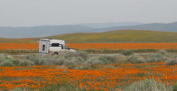 Old-style pickup truck camper